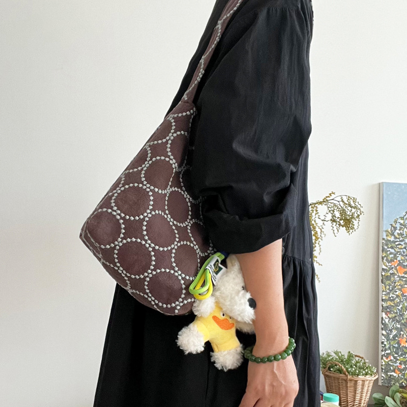 حقائب دلو يابانية الطراز للنسا - مراجعة Luxury Bags In Japan وسعره